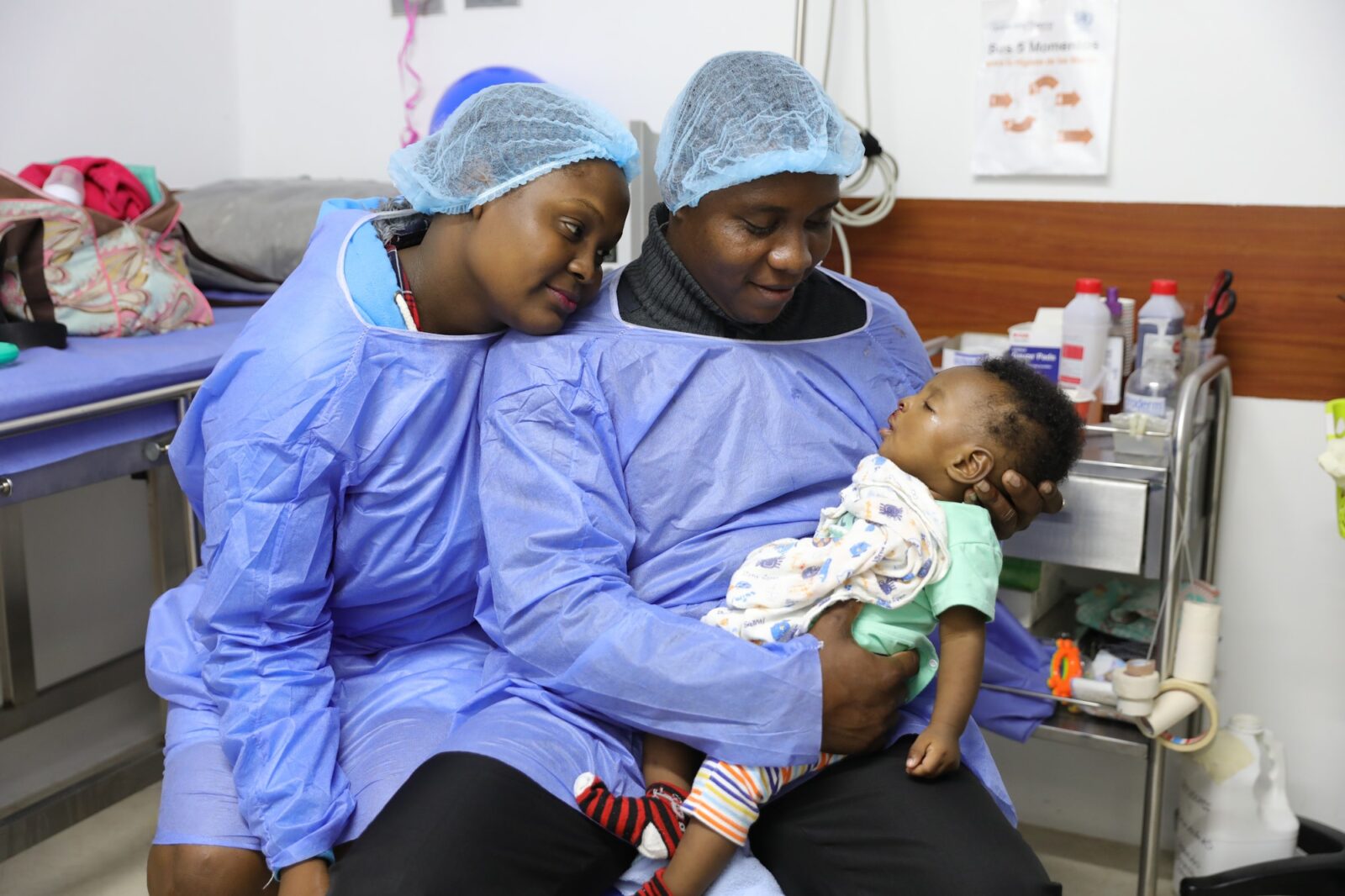 Jhony with his parents after surgery