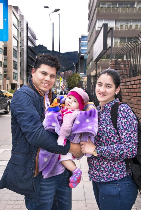Luciana with her parents after surgery.