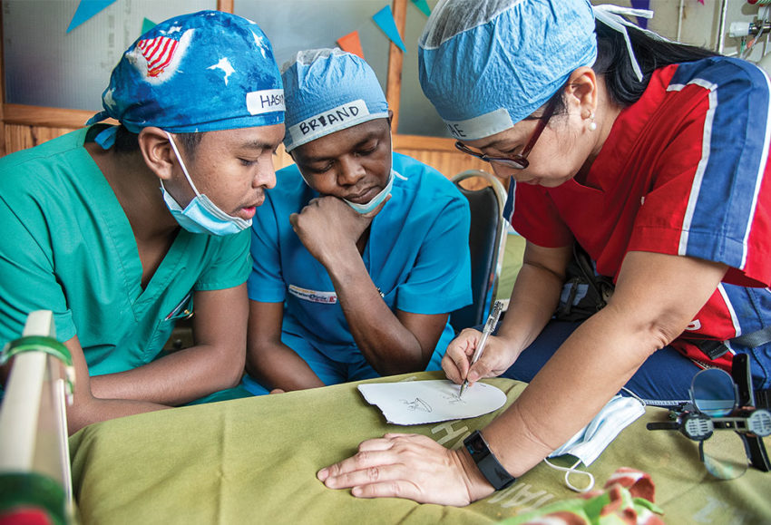 Expert cleft surgeon Dr. Lora Mae de Guzman of the Philippines instructs Dr. Briand Rakotomanga (with his translator) as part of our cleft surgery training program in Madagascar.