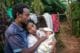 Genet Ayele holding her child Meheftehe