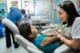 Dentist talking to child patient at Honduras Care Centre