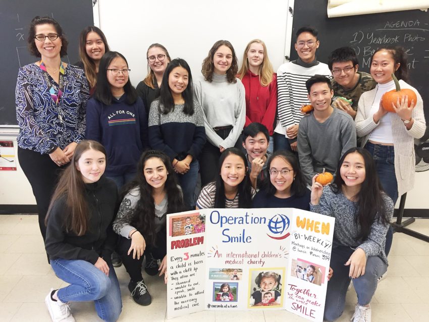 Students posing with Operation Smile Project