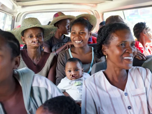 Patients who have never visited the capital city - Antananarivo - travel by mini bus from the Op Smile patient shelter to the hospital on the first day of screening