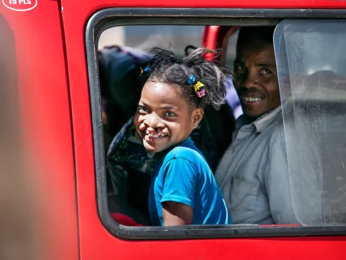 Clara Tanjonirinalalao with father Dede on route home after a visit to a rural clinic a 2 hour walk from Clara's home.