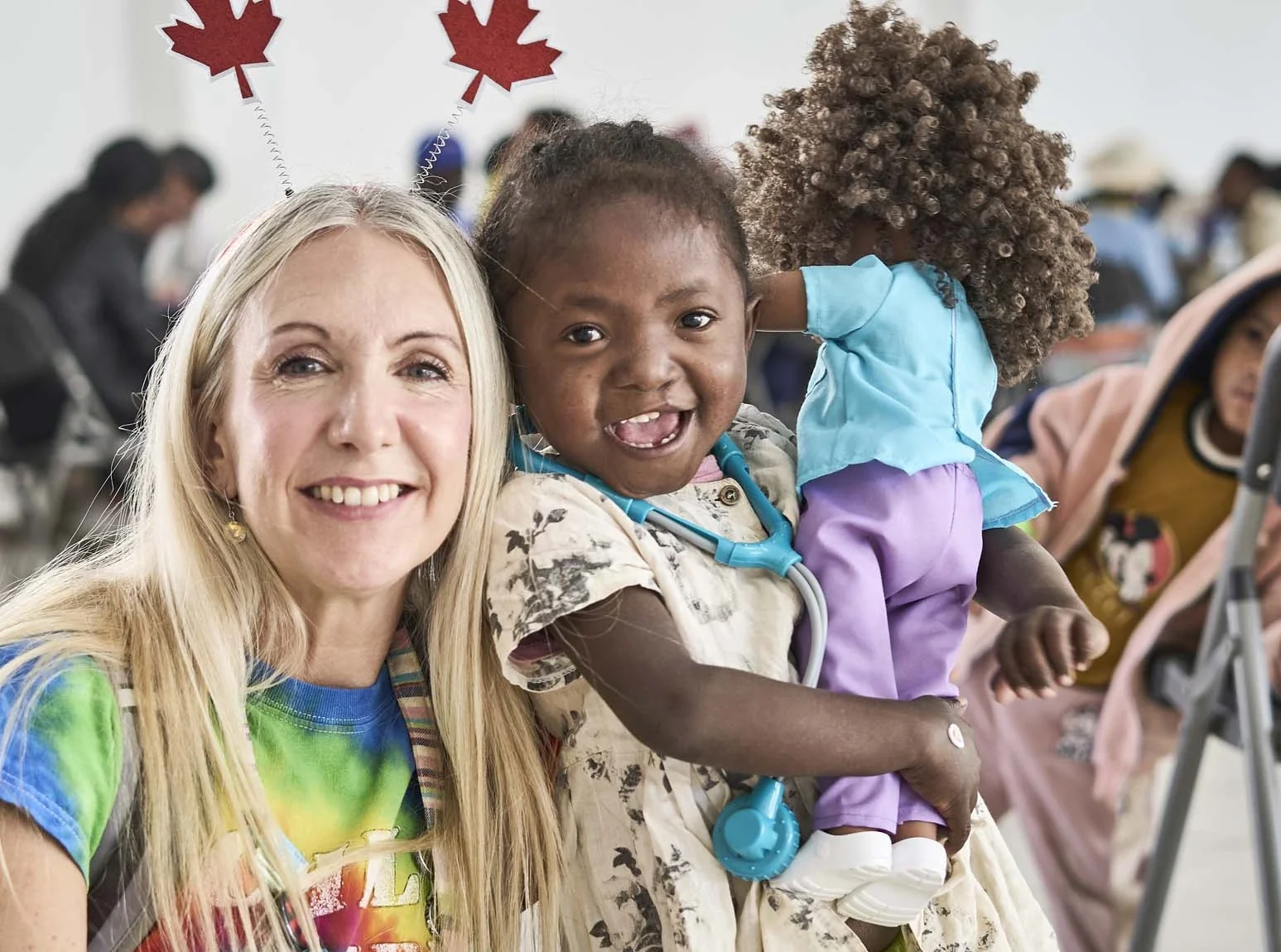 Canadian volunteer interacts with patients at a surgical program in Madagascar