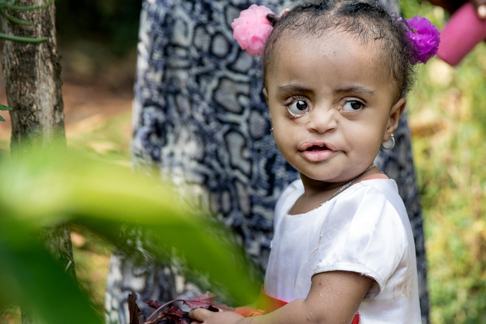 Meftehe Jafar playing in a garden