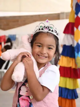 Lilia's smile brings joy to those around her.