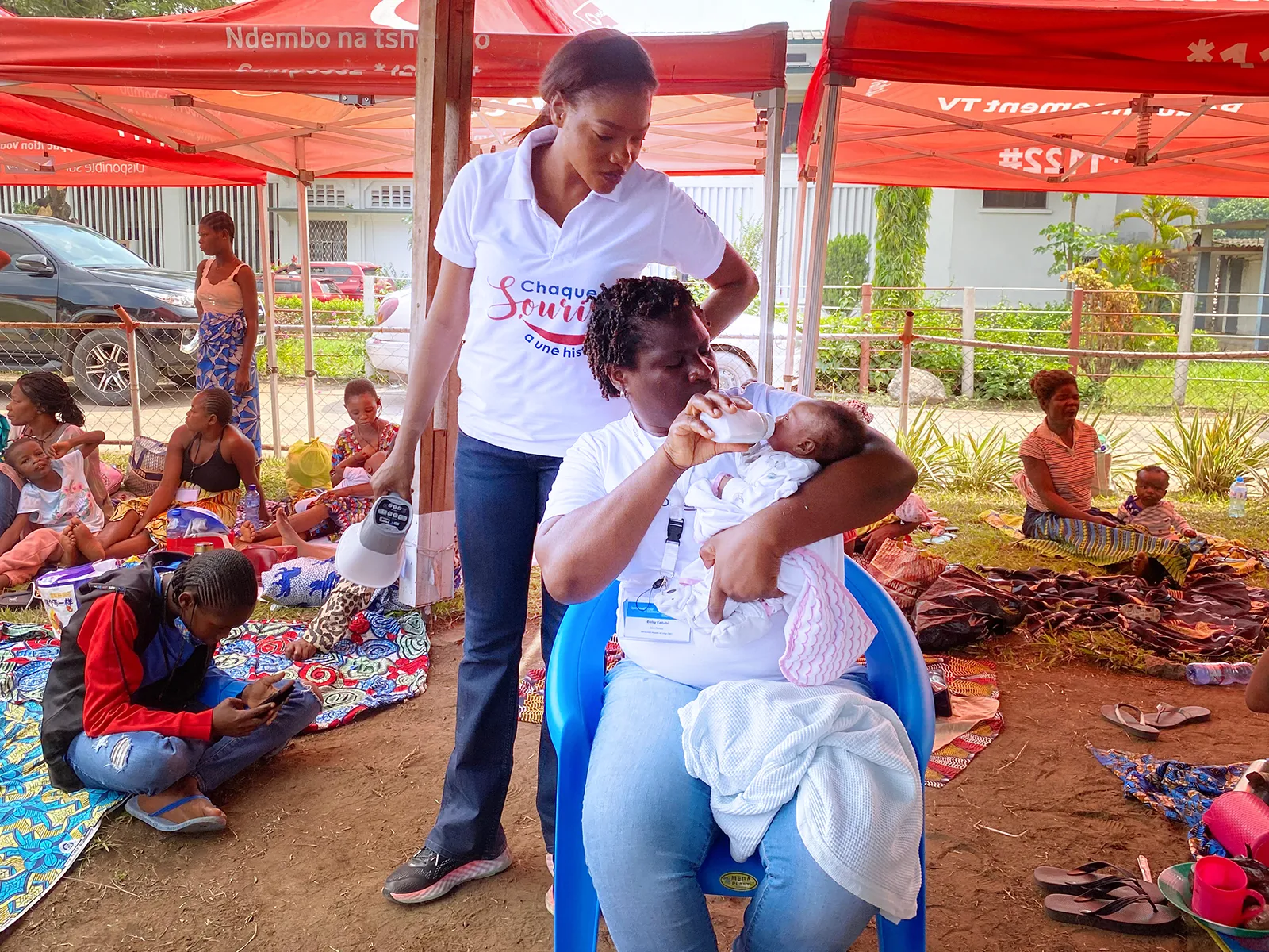 A mother feeding her child with cleft a bottle