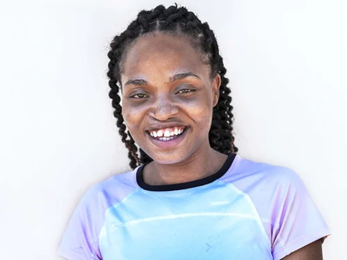 Carol is proud of her smile and wants children born with cleft conditions to know that there is hope and that they are not alone.