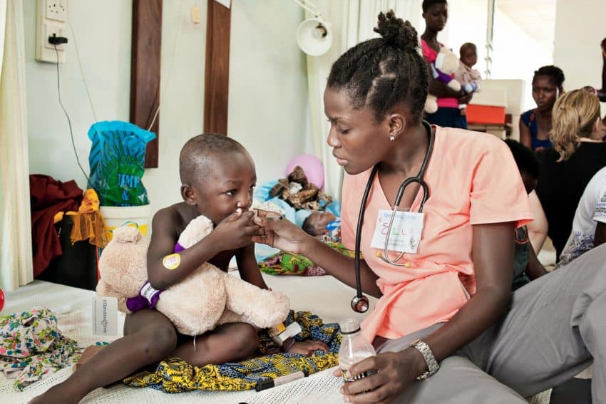 4 year old Debora Fogoe with Pediatric Resident Emmanuella Amoako.