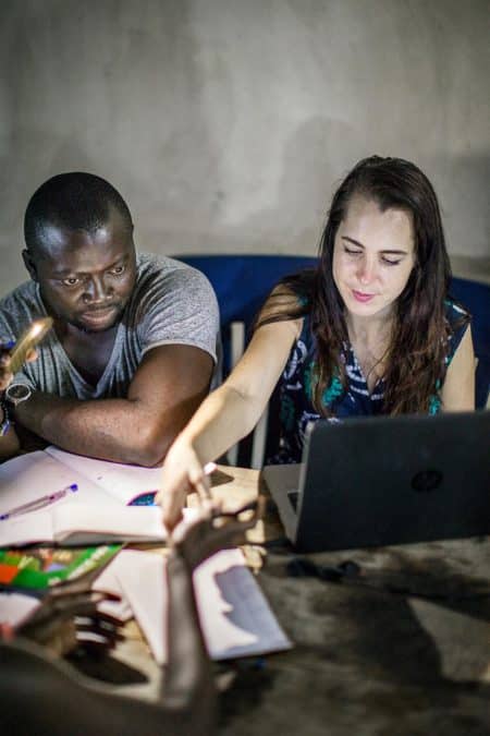 Sabrina and Clement working in Ghana office