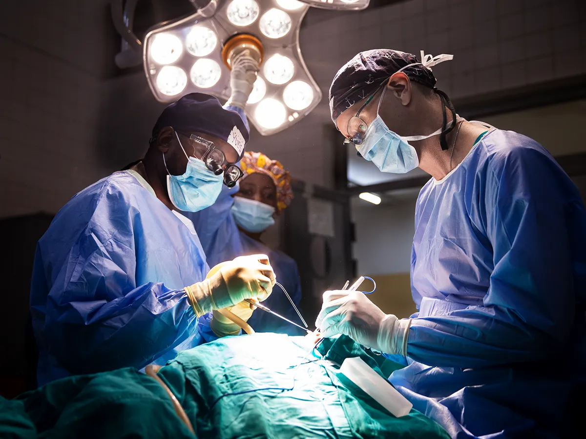 Surgeons performing a cleft repair